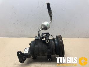 Used Air conditioning pump Nissan Pixo (D31S) 1.0 12V Price on request offered by Van Gils Automotive