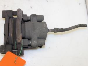 Used Rear brake calliper, left BMW 5 serie (E39) 525 tds Price € 65,00 Margin scheme offered by Van Gils Automotive