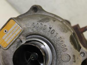 Turbo van een Renault Megane II Grandtour (KM) 1.5 dCi 80 2005