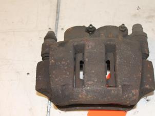 Used Front brake calliper, left Renault Master III (FD/HD) 1.9 dTi Price € 70,00 Margin scheme offered by Van Gils Automotive