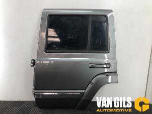 Używane Drzwi lewe tylne wersja 4-drzwiowa Jeep Commander (XK) 3.0 CRD Cena € 299,99 Procedura marży oferowane przez Van Gils Automotive