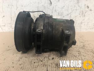 Compresseur de clim d'un SsangYong Musso 2.9TD 1999
