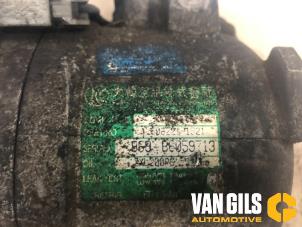 Compresseur de clim d'un SsangYong Musso 2.9TD 1999