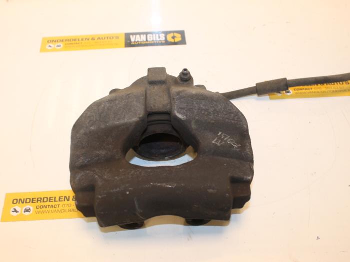 Front brake calliper, left from a Volkswagen Transporter T5 1.9 TDi 2007