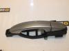 Rear door handle 4-door, left from a Ford Mondeo IV Wagon 2.0 16V 2008