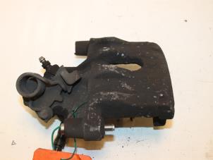Used Rear brake calliper, left Ford C-Max (DM2) 1.6 16V Price € 30,00 Margin scheme offered by Van Gils Automotive