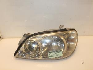 Used Headlight, left Kia Carnival 2 (FIB/FLD) 2.5 V6 24V Price € 65,00 Margin scheme offered by Van Gils Automotive