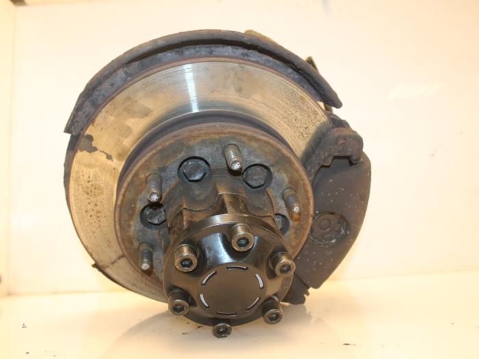 Knuckle, front left from a SsangYong Musso 2.9TD 2002