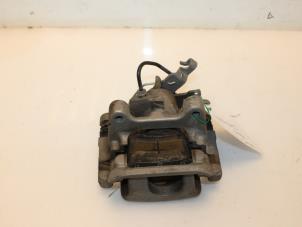 Used Rear brake calliper, left Volkswagen Caddy IV 2.0 TDI 122 Price € 53,24 Inclusive VAT offered by Van Gils Automotive