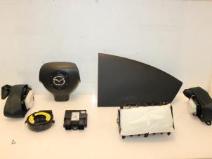 Usagé Kit + module airbag Mazda 2 (NB/NC/ND/NE) 1.4 16V Prix € 349,00 Règlement à la marge proposé par Van Gils Automotive