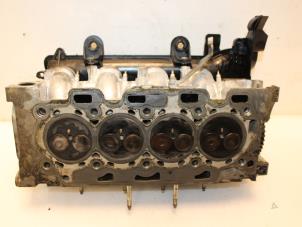 Used Cylinder head Peugeot 206 (2A/C/H/J/S) 1.4 HDi Price € 199,99 Margin scheme offered by Van Gils Automotive