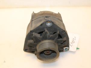 Dynamo van een Mercedes 614 1998