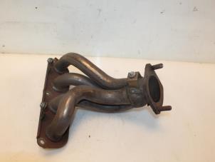 Used Exhaust manifold Kia Carens IV (RP) 2.0 GDI 16V Price € 76,00 Margin scheme offered by Van Gils Automotive