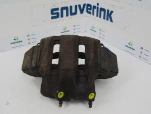 Used Front brake calliper, left Renault Trafic I (TXX) 2.1 D T900 Price on request offered by Snuverink Autodemontage