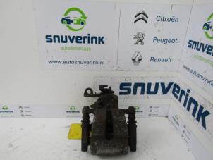 Usagé Etrier de frein (pince) arrière gauche Renault Scénic I (JA) 1.8 16V Prix € 40,00 Règlement à la marge proposé par Snuverink Autodemontage