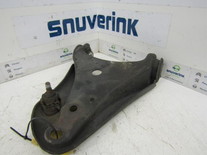Front wishbone, left from a Renault Twingo II (CN) 1.2 16V LEV 2011