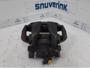 Used Rear brake calliper, right Renault Clio IV (5R) 0.9 Energy TCE 90 12V Price on request offered by Snuverink Autodemontage