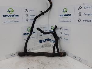 Used Radiator hose Renault Trafic New (FL) 2.0 dCi 16V 90 Price on request offered by Snuverink Autodemontage