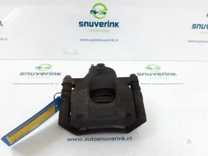 Used Front brake calliper, right Peugeot 107 1.0 12V Price € 20,00 Margin scheme offered by Snuverink Autodemontage