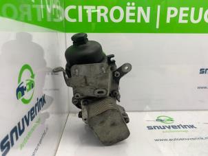 Używane Obudowa filtra oleju Citroen C4 Berline (NC) 1.6 e-HDI Cena € 75,00 Procedura marży oferowane przez Snuverink Autodemontage