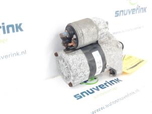 Starter from a Renault Twingo II (CN) 1.2 16V 2010