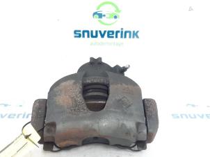 Used Front brake calliper, left Renault Wind (EN/E4) 1.2 16V GT TCE eco2 Price on request offered by Snuverink Autodemontage