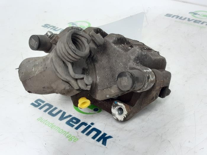 Rear brake calliper, left Volvo V40 1.6 D2 36001765 D4162T VOLVO