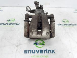 Used Rear brake calliper, right Mini Mini (R56) 1.6 16V One Price € 40,00 Margin scheme offered by Snuverink Autodemontage