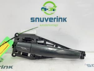 Used Rear door handle 4-door, right Opel Corsa E 1.4 16V Price on request offered by Snuverink Autodemontage