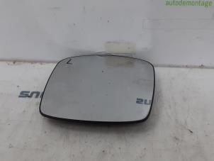 Used Mirror glass, left Renault Kangoo/Grand Kangoo (KW) 1.6 16V Price € 15,00 Margin scheme offered by Snuverink Autodemontage