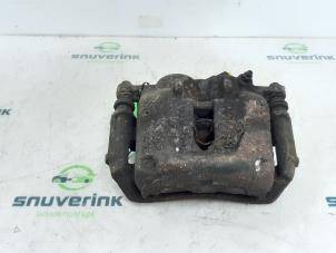 Used Front brake calliper, left Opel Vivaro 1.9 DTI 16V Price on request offered by Snuverink Autodemontage