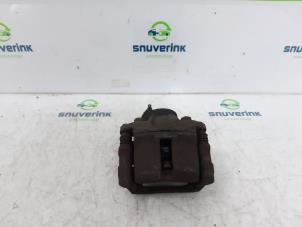 Used Front brake calliper, right Renault Twingo II (CN) 1.2 Price € 50,00 Margin scheme offered by Snuverink Autodemontage