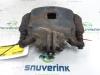 Front brake calliper, right from a Nissan NV 200 (M20M) 1.5 dCi 86 2014