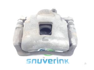 Used Front brake calliper, left Citroen C4 Cactus (0B/0P) 1.2 PureTech 82 12V Price on request offered by Snuverink Autodemontage