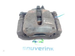 Used Front brake calliper, left Citroen C3 Picasso (SH) 1.6 16V VTI 120 Price on request offered by Snuverink Autodemontage