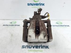 Used Rear brake calliper, left Mini Clubman (R55) 1.6 16V One Price on request offered by Snuverink Autodemontage