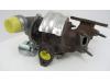 Turbo from a Renault Twingo II (CN) 1.5 dCi 90 FAP 2012