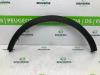 Flared wheel arch from a Renault Captur (2R) 0.9 Energy TCE 12V 2016