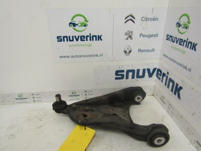 Front wishbone, left from a Renault Twingo II (CN) 1.2 16V 2012