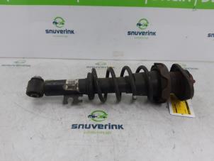 Used Rear shock absorber, left Mini Mini (R56) 1.6 16V One Price € 35,00 Margin scheme offered by Snuverink Autodemontage