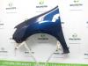 Front wing, left from a Dacia Logan MCV II/Sandero Wagon (7S) 0.9 TCE 12V 2016