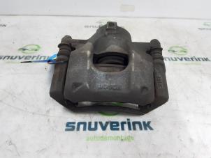 Used Front brake calliper, right Peugeot 108 1.0 12V VVT-i Price € 25,00 Margin scheme offered by Snuverink Autodemontage