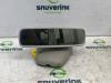 Rear view mirror from a Renault Clio IV (5R) 0.9 Energy TCE 90 12V 2014