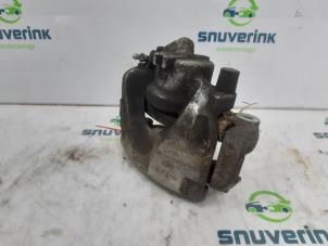 Used Front brake calliper, right Renault Express 1.5 dCi 75 Price on request offered by Snuverink Autodemontage