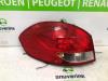 Taillight, left from a Renault Clio III Estate/Grandtour (KR), 2007 / 2014 1.2 16V TCE 100, Combi/o, Petrol, 1.149cc, 74kW (101pk), FWD, D4F784; D4FH7, 2007-11 / 2012-12, KR14; KR1P; KRC4; KRCP 2008