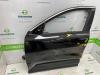 Dörr, 4-dörrars, vänster fram från en Renault Scenic E-Tech Electric (RCB) EV60 2024