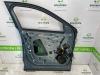 Door 4-door, front left from a Peugeot 3008 III e-3008 210 73 kWh 2024