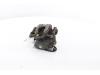 Rear brake calliper, left from a Peugeot 3008 III e-3008 210 73 kWh 2024