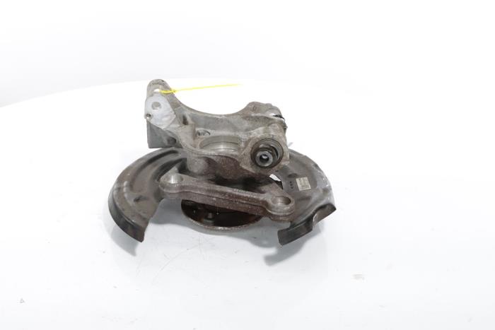 Knuckle, rear left from a Peugeot 3008 III e-3008 210 73 kWh 2024