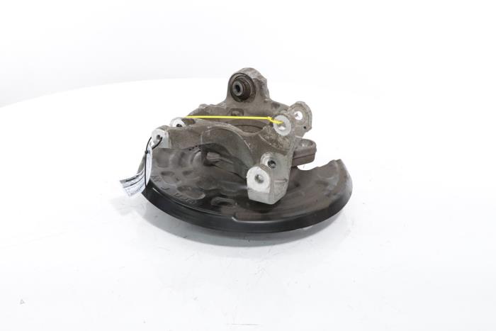 Knuckle, rear left from a Peugeot 3008 III e-3008 210 73 kWh 2024